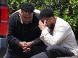 Two men embrace at the scene of a shooting outside the Islamic Center of San Diego Monday, May 18, 2026, in San Diego. (AP Photo/Gregory Bull) Copyright 2026 The Associated Press. All rights reserved